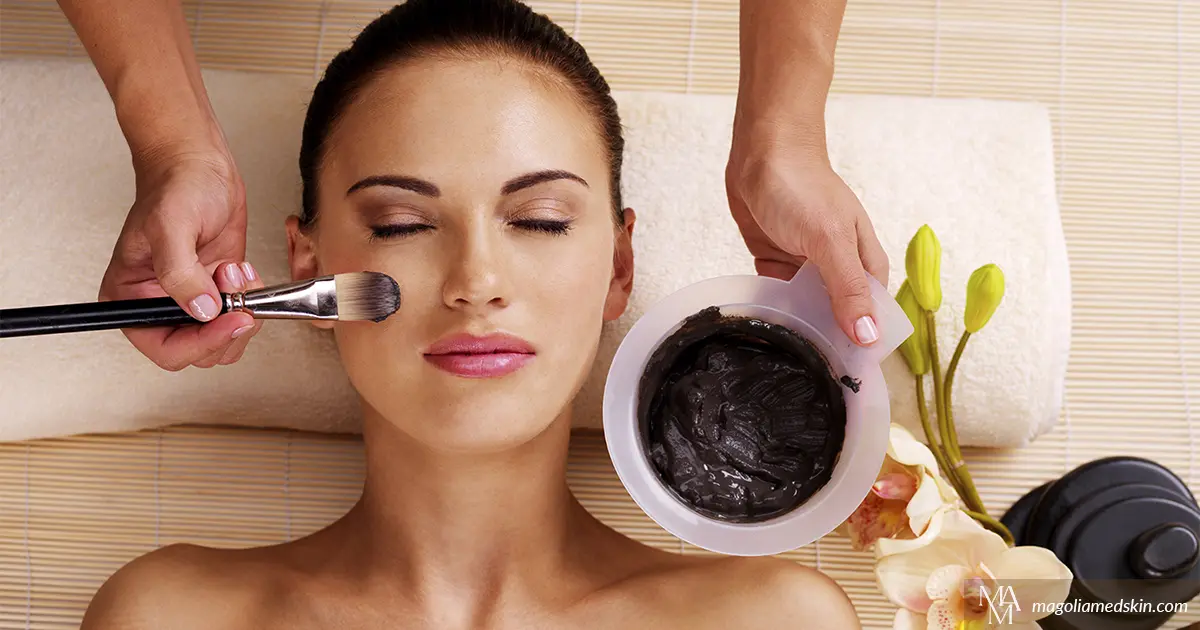 Woman getting deep cleansing facials near you