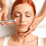 Woman getting oxygen facial with cryotherapy