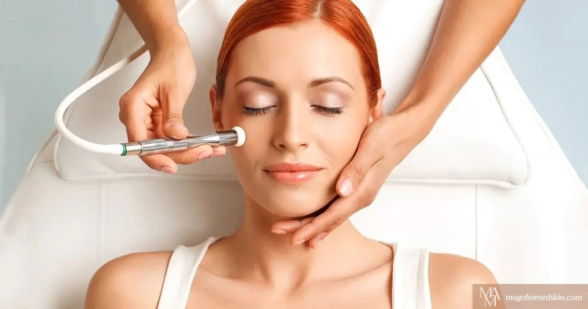 Woman getting oxygen facial with cryotherapy